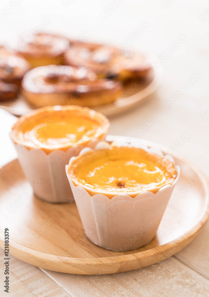 egg tart on plate egg tart on plate