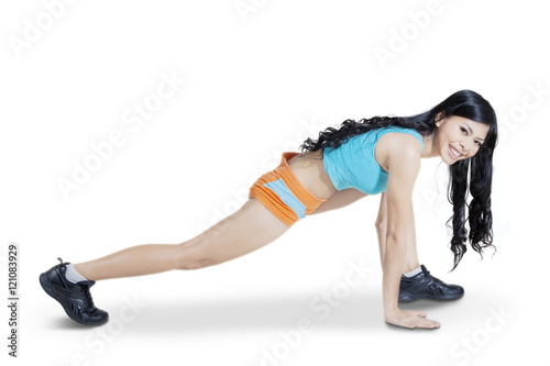 Young woman stretching her body