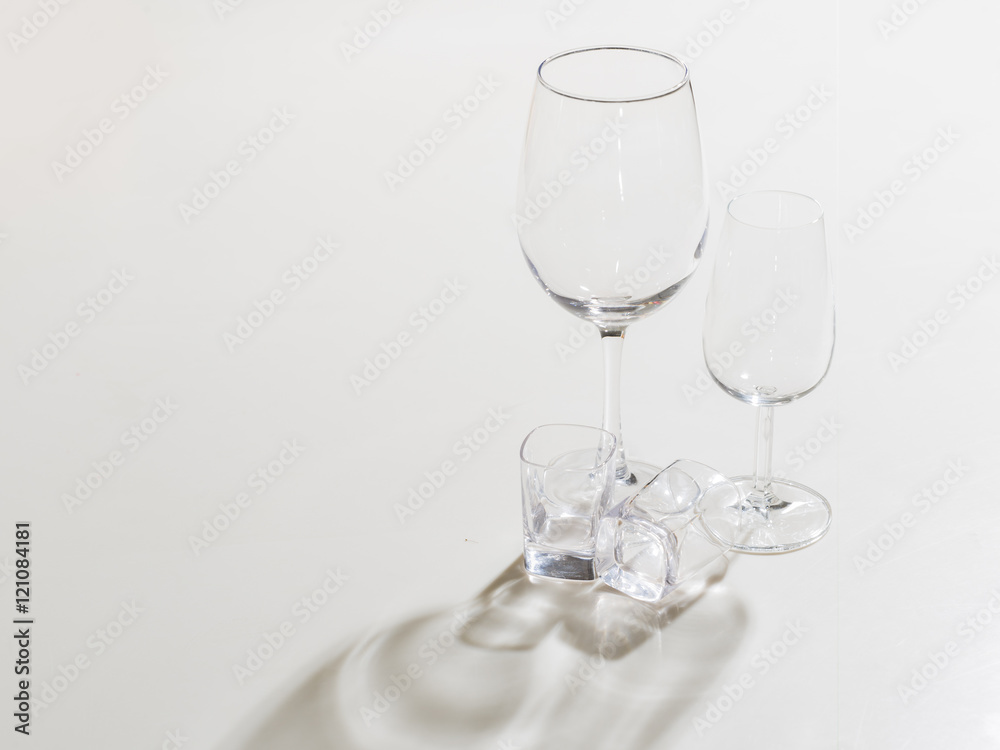 set of wine glasses on a white background shot from above with reflection set of wine glasses on a white background shot from above with reflection