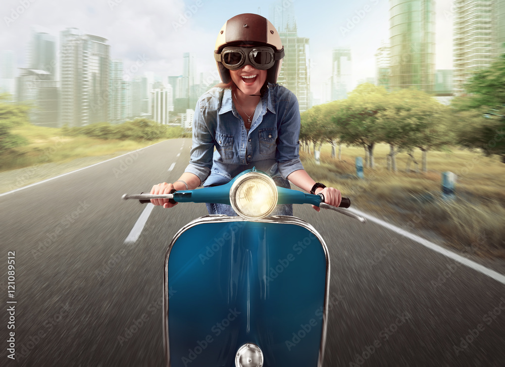 Asian women riding a blue scooter