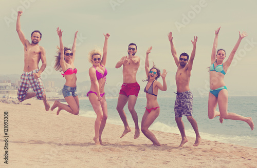 People jumping at beach