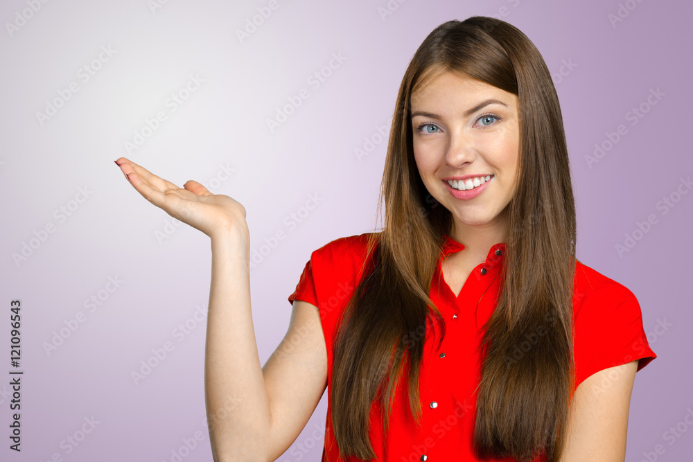 smiling young woman pointing smiling young woman pointing