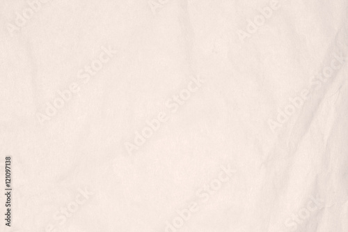 Recycled crumpled light brown paper texture or paper background for design with copy space for text or image.