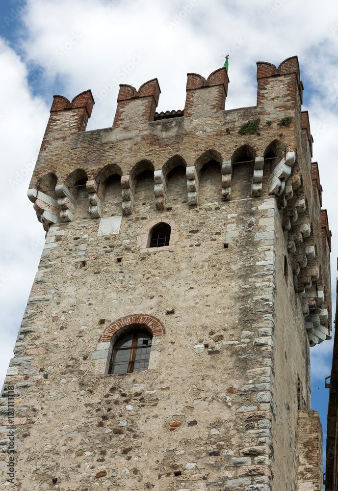 Medieval castle Scaliger in old town Sirmione on lake Lago di Garda. Italy Medieval castle Scaliger in old town Sirmione on lake Lago di Garda. Italy