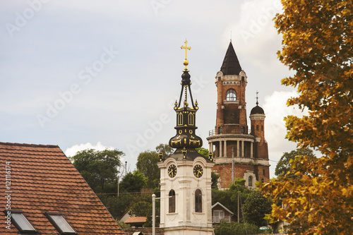 Gardos Tower and orthodox church with autumn colors in Zemun,Serbia photo