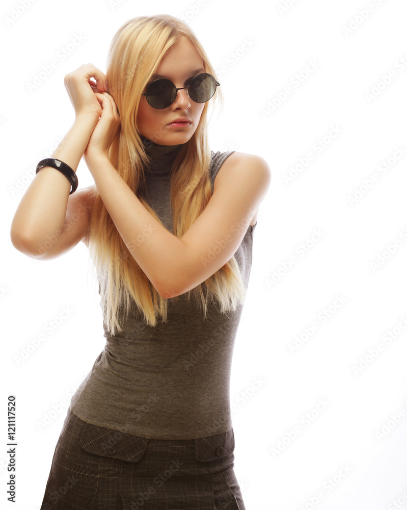 Beauty stylish blonde woman posing in fashionable clothes and bi Beauty stylish blonde woman posing in fashionable clothes and bi