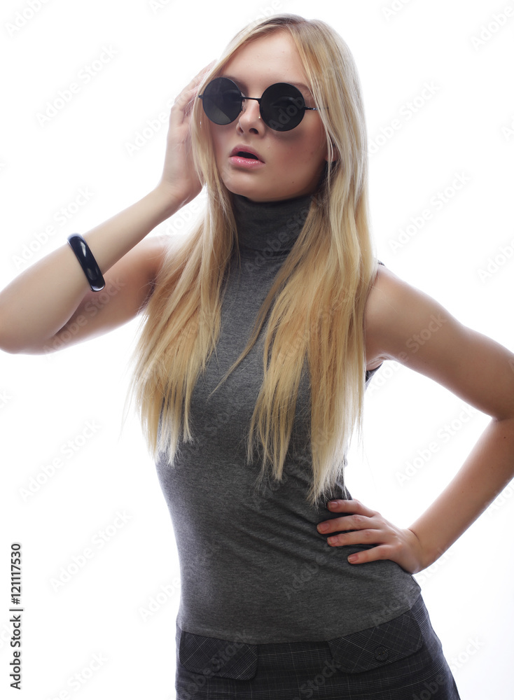 Beauty stylish blonde woman posing in fashionable clothes and bi Beauty stylish blonde woman posing in fashionable clothes and bi