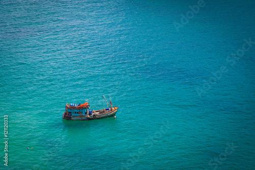Fishing boat in the sea © DK