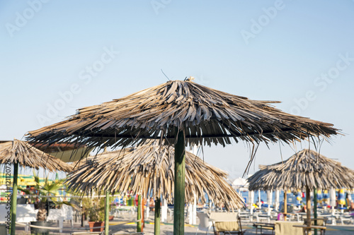 Beach thatched umbrellas  