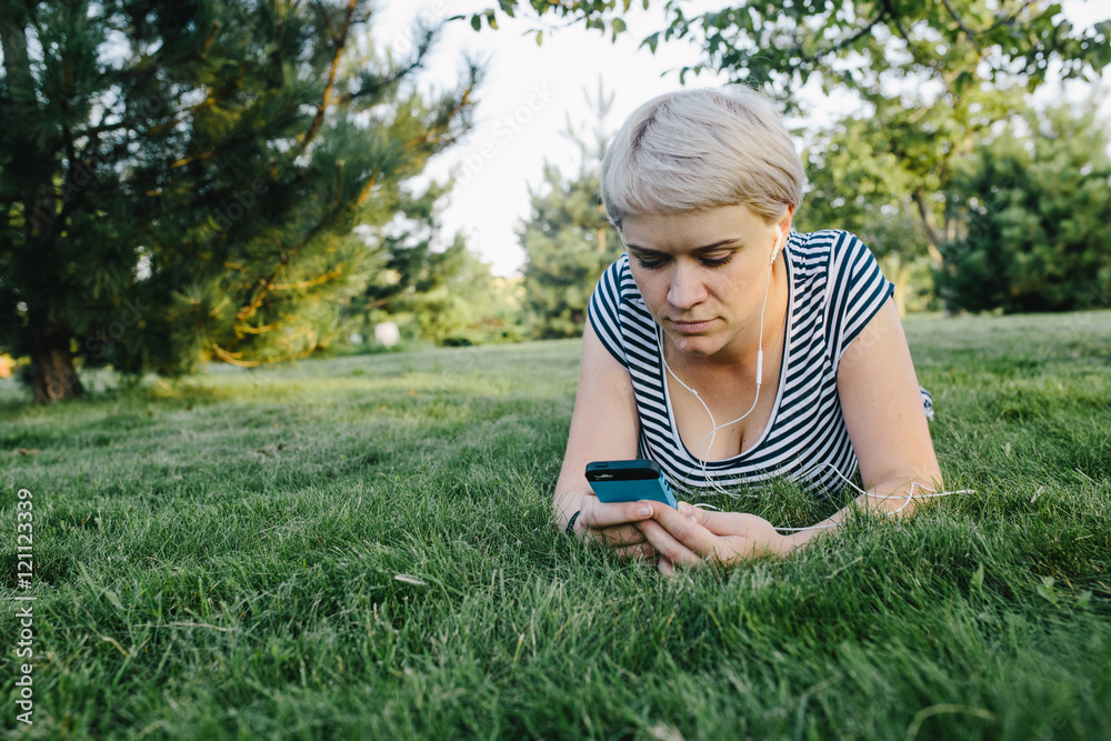 young woman reading something on her phone with and something puzzled young woman reading something on her phone with and something puzzled