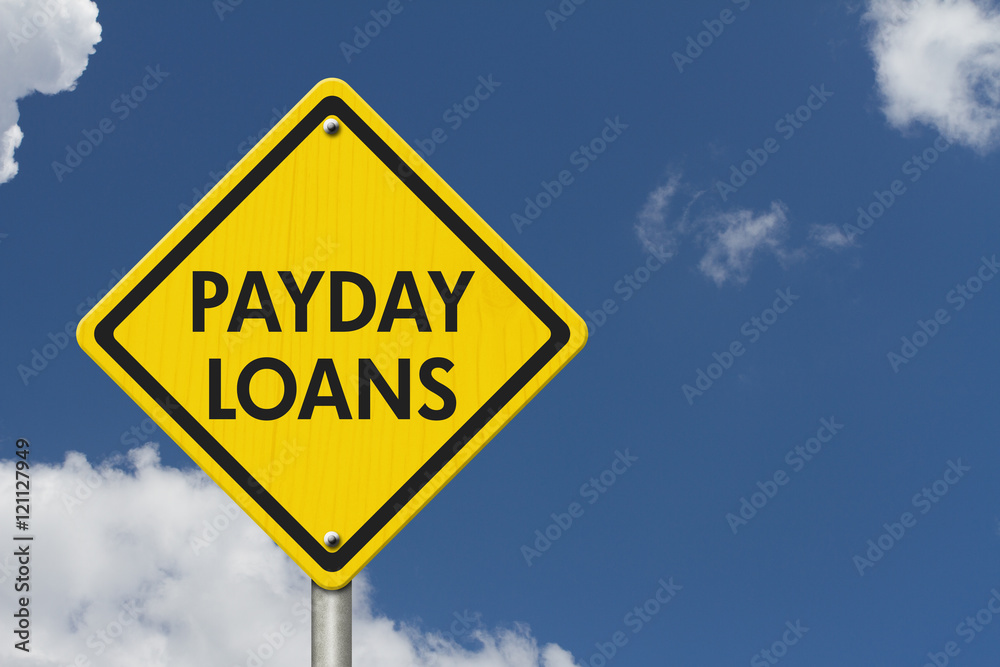 Payday Loans yellow warning highway road sign Payday Loans yellow warning highway road sign