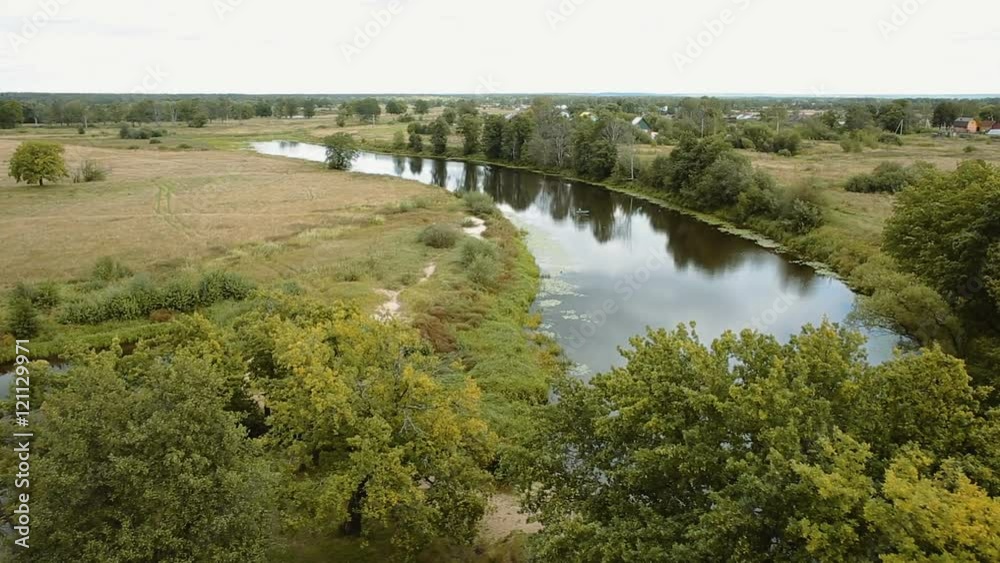 beautiful river landscape in the background of a small village beautiful river landscape in the background of a small village