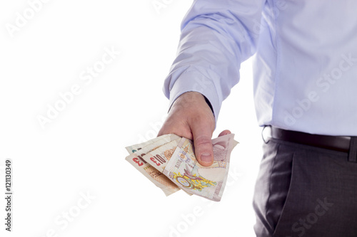 Corruption concept.

Businessman giving a bribe.
