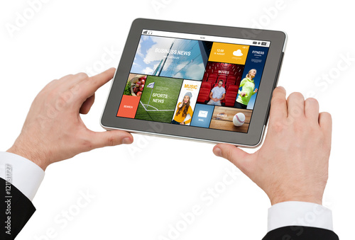 close up of hands holding tablet pc with