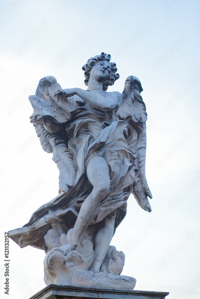 Sculpture of beautiful angel standing before Museo Nazionale di