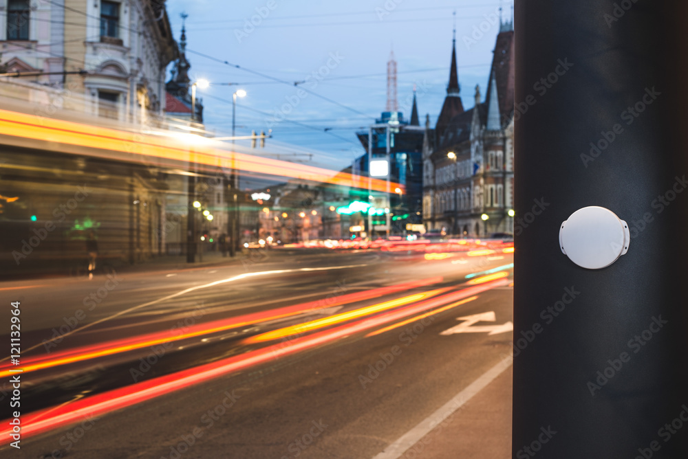 Naklejka premium Bluetooth Low Energy Beacon – location intelligence sensor in smart cities / A Bluetooth Beacon device installed on a bus stop, to digitally guide passengers.