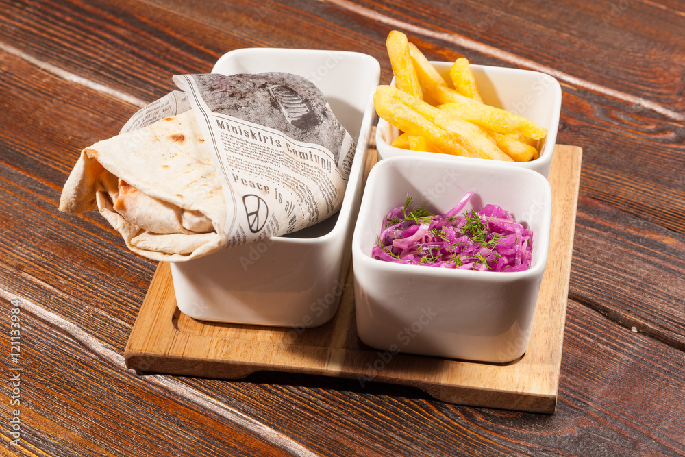 shawarma with salad and French fries shawarma with salad and French fries