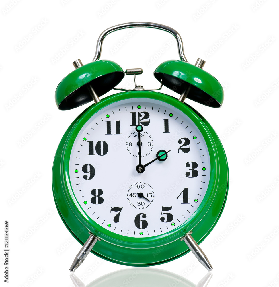 Retro alarm clock isolated on white background. Green alarmclock old