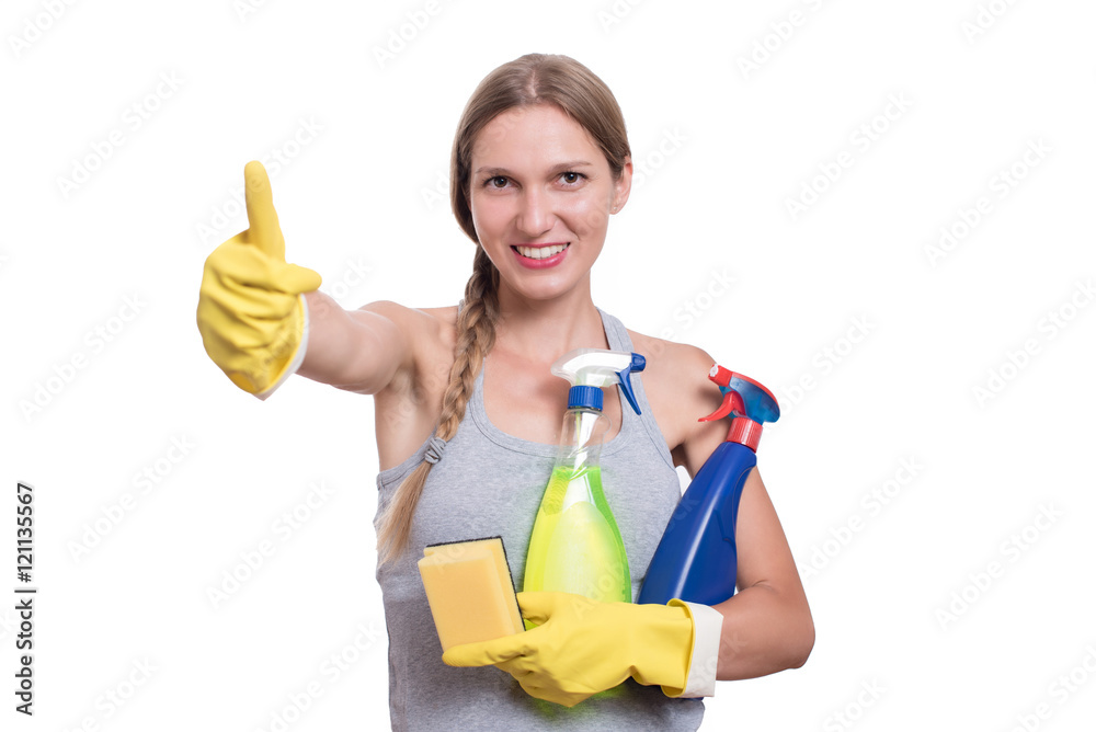 Smiling woman holding bottles of chemistry for cleaning house Smiling woman holding bottles of chemistry for cleaning house