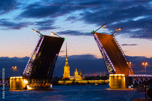 Open Palace Bridge and view of the Peter and Paul Fortress in St.Petersburg in white night