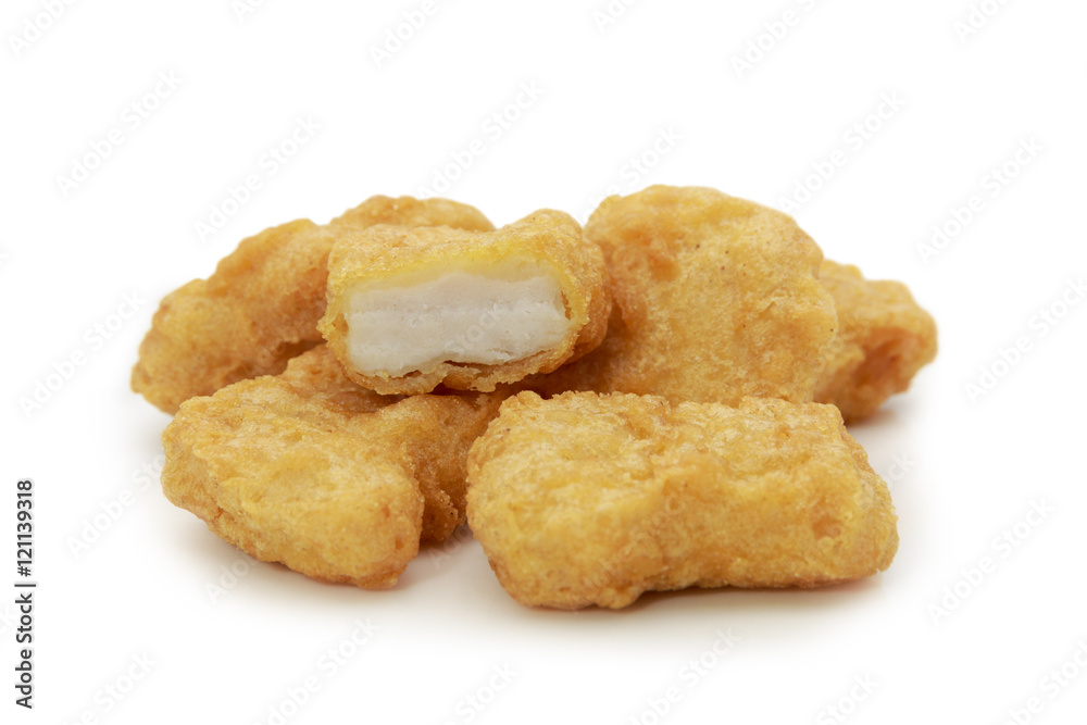 Fried chicken nuggets isolated on white background.