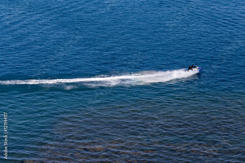 jet ski on the surface of the water at a speed of