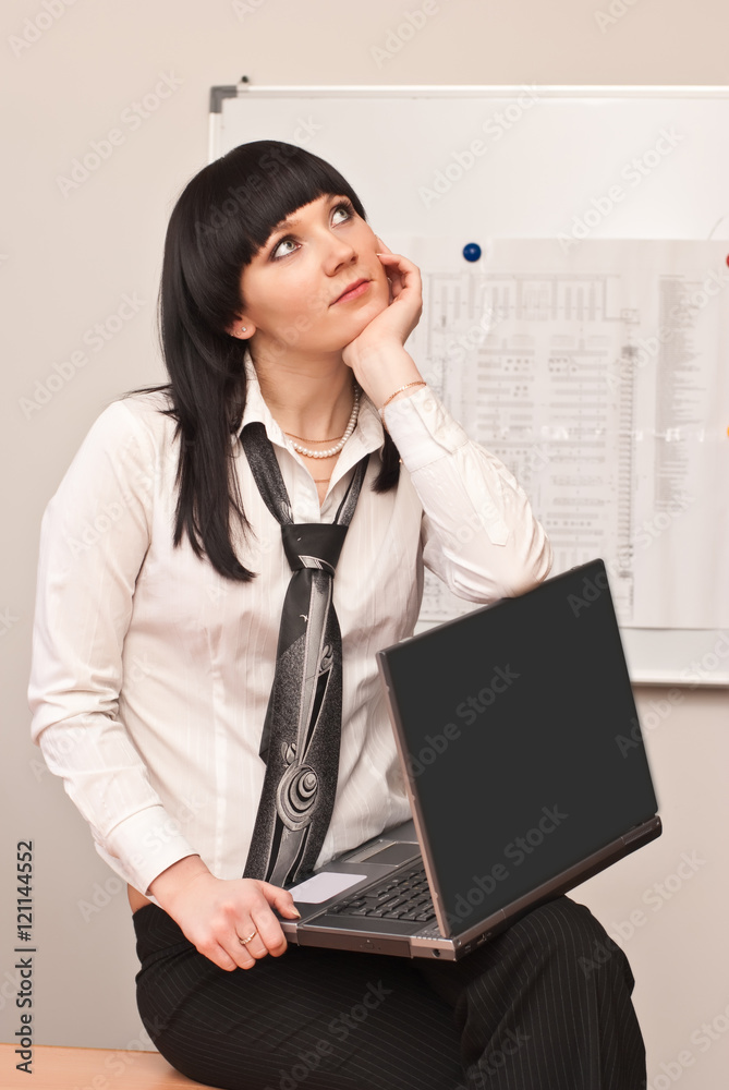 Young businesswoman dreams of a summer vacation Young businesswoman dreams of a summer vacation