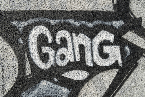 Word gang, detail of a graffiti in Milan, Italy, street art.