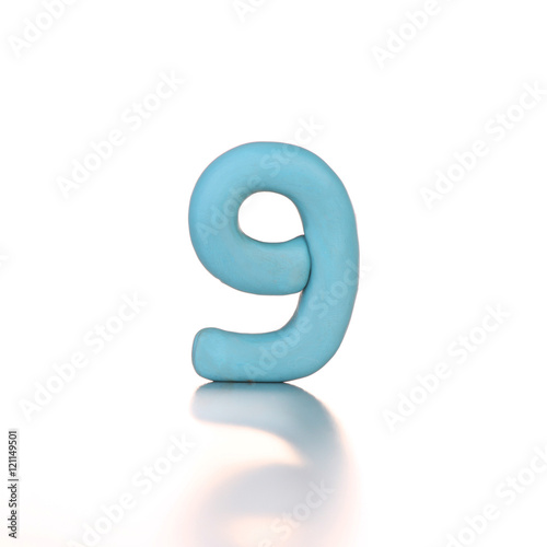9 number nine made from plasticine isolated light blue