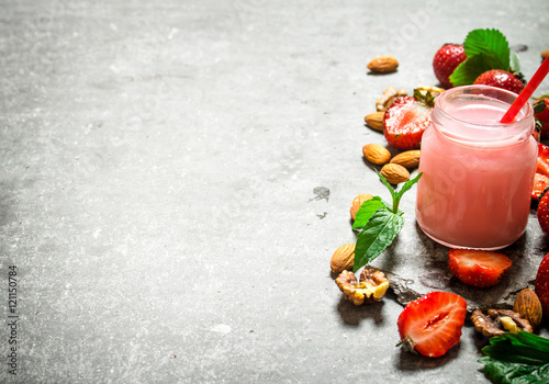 Strawberry smoothie with mint and nuts.