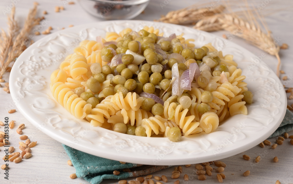 fusilli pasta with onion and peas fusilli pasta with onion and peas