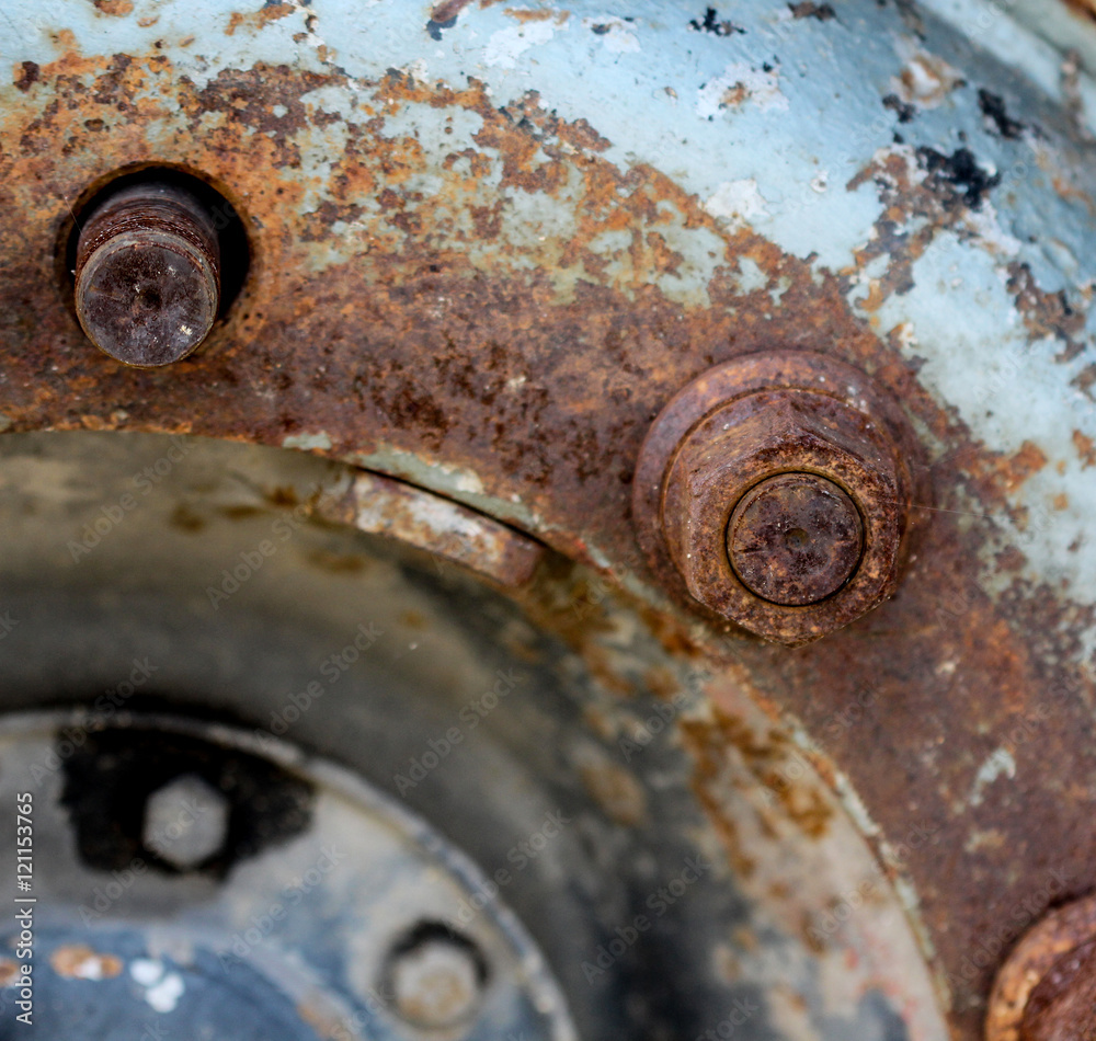 details close upof and old rusty truck wheel details close upof and old rusty truck wheel