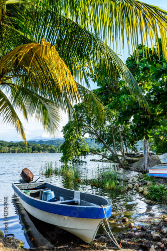 Boats in late afternoon light on Rio Dulce  Livingston  Guatemala