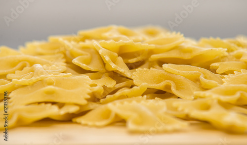 Closeup of uncooked italian pasta - farfalle