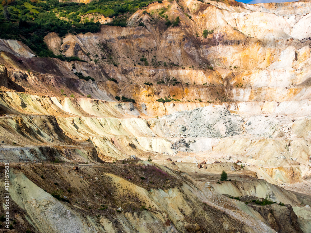      abandoned sulfur surface mining pit near calimani mountains romania 