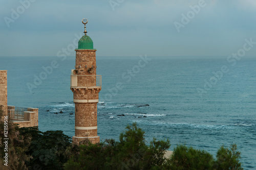 View on the mediterranien sea from old Jaffa with a mosque at the foreground photo