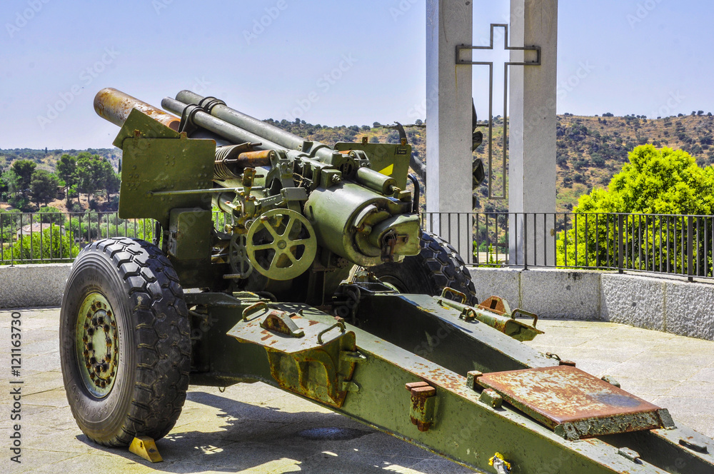 Antiaircraft gun with Christian Cross on the background Antiaircraft gun with Christian Cross on the background