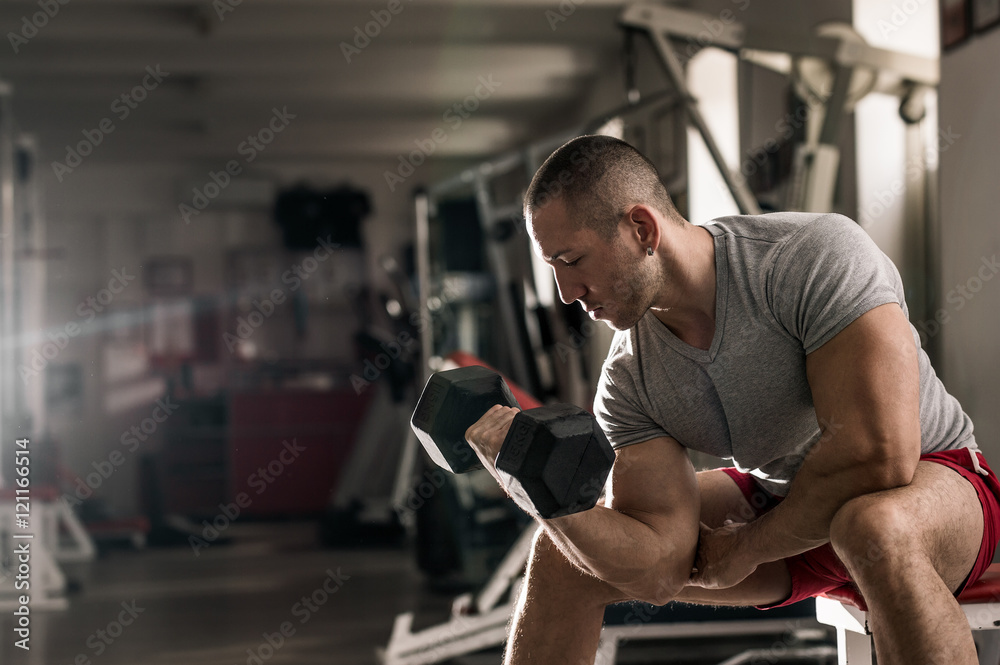 very power athletic guy bodybuilder , execute exercise with dumb very power athletic guy bodybuilder , execute exercise with dumb