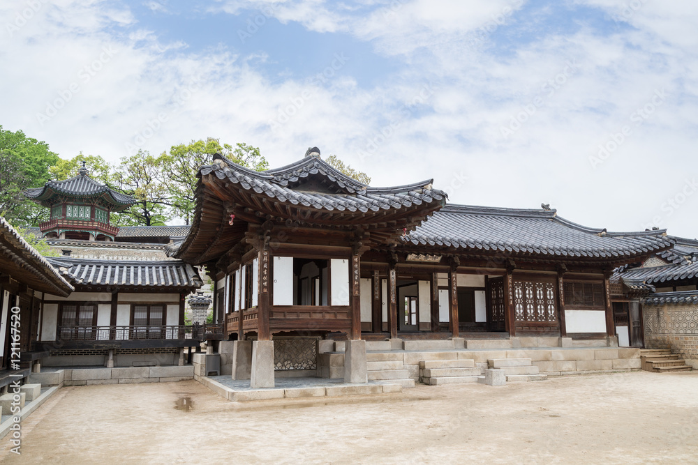 Wooden buildings at Nakseonjae Complex at the Changdeokgung Palace in Seoul, South Korea. Copy space. Wooden buildings at Nakseonjae Complex at the Changdeokgung Palace in Seoul, South Korea. Copy space.