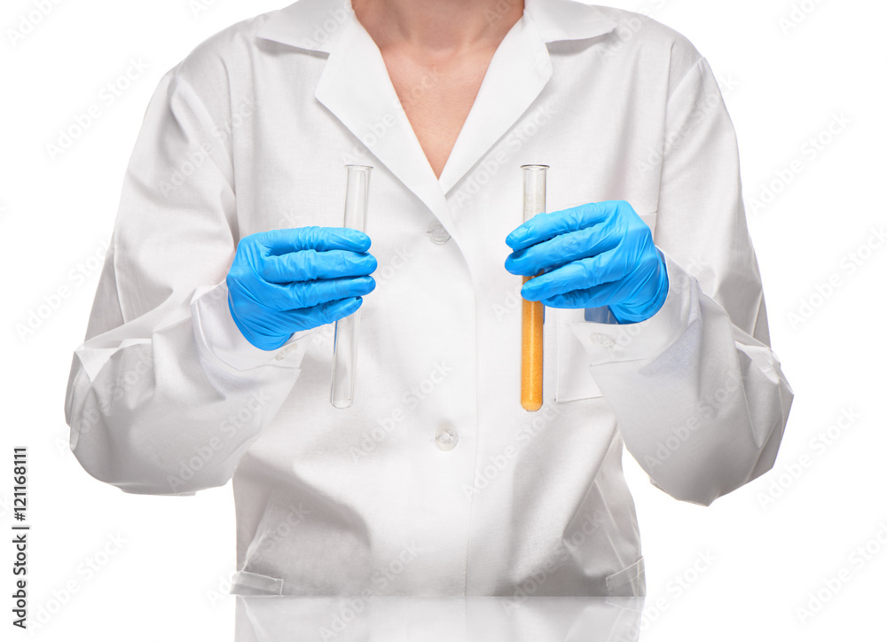 Female holding empty test tube and with yellow sorbent Female holding empty test tube and with yellow sorbent