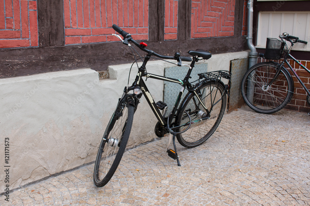 City bicycle fixed gear and red brick wall. City bicycle fixed gear and red brick wall.