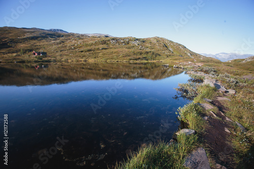Hiking in Norway, classic norwegian scandinavian summer mountain norwegian landscape  © tsuguliev