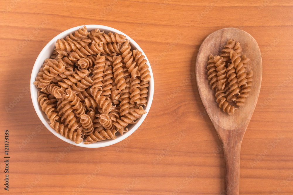 Wholemeal Fusilli into a bowl. Integral Pasta Wholemeal Fusilli into a bowl. Integral Pasta