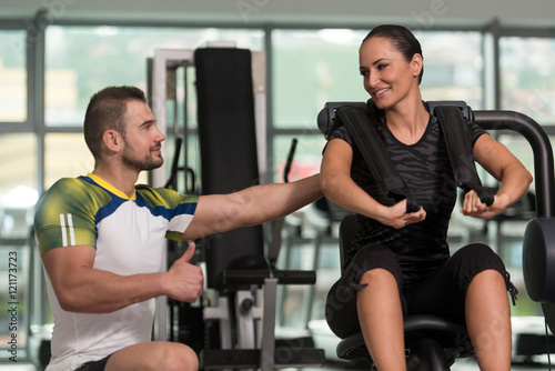 Personal Trainer Showing Ok Sign To Client