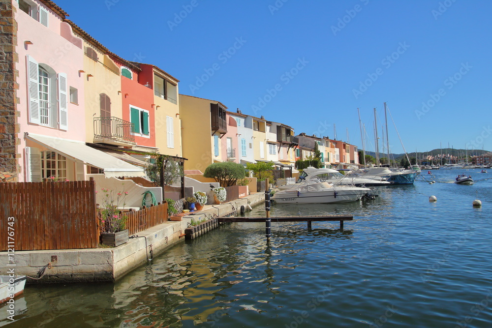 Pretty pastel colored houses on the waterfront in Port Grimaud in France