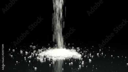 Rock Salt Crystals Being Poured Slow Motion