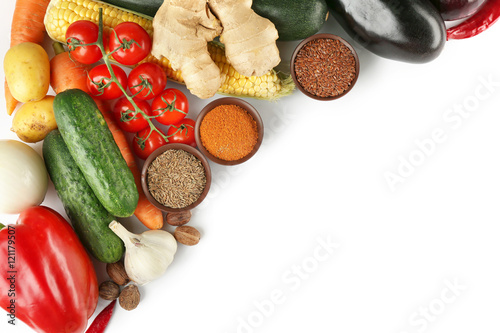 Vegetables and spices on white background