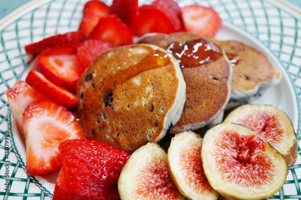 Vegan pancakes with fresh figs and strawberries Vegan pancakes with fresh figs and strawberries