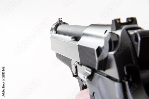 9mm Handgun on a white background.