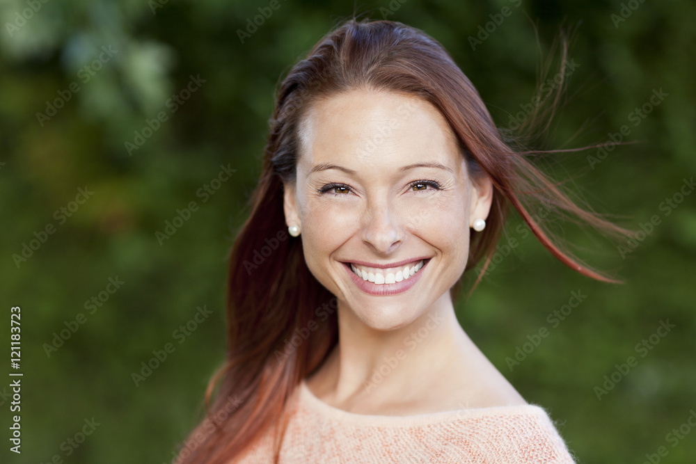 Smiling Woman Outside Looking At The Camera Smiling Woman Outside Looking At The Camera